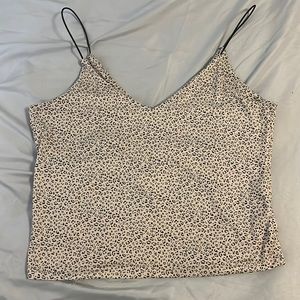 Cheetah print crop top, mid length. Not super short